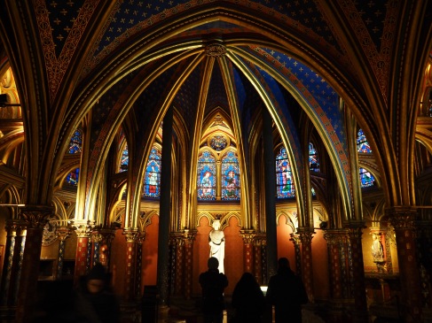 The lower chapel of Sainte-Chapelle with a statue of Louis IX, later recognised by the Catholic church as a saint